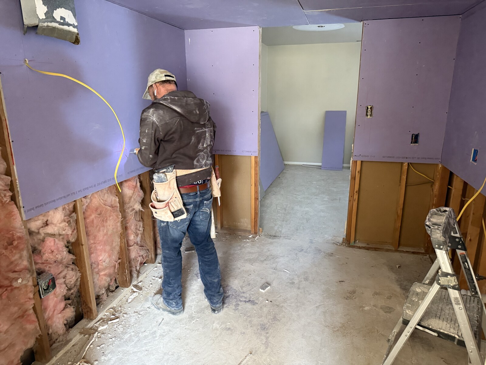 AD Construction crew installing drywall at JBAB military housing in Washington DC